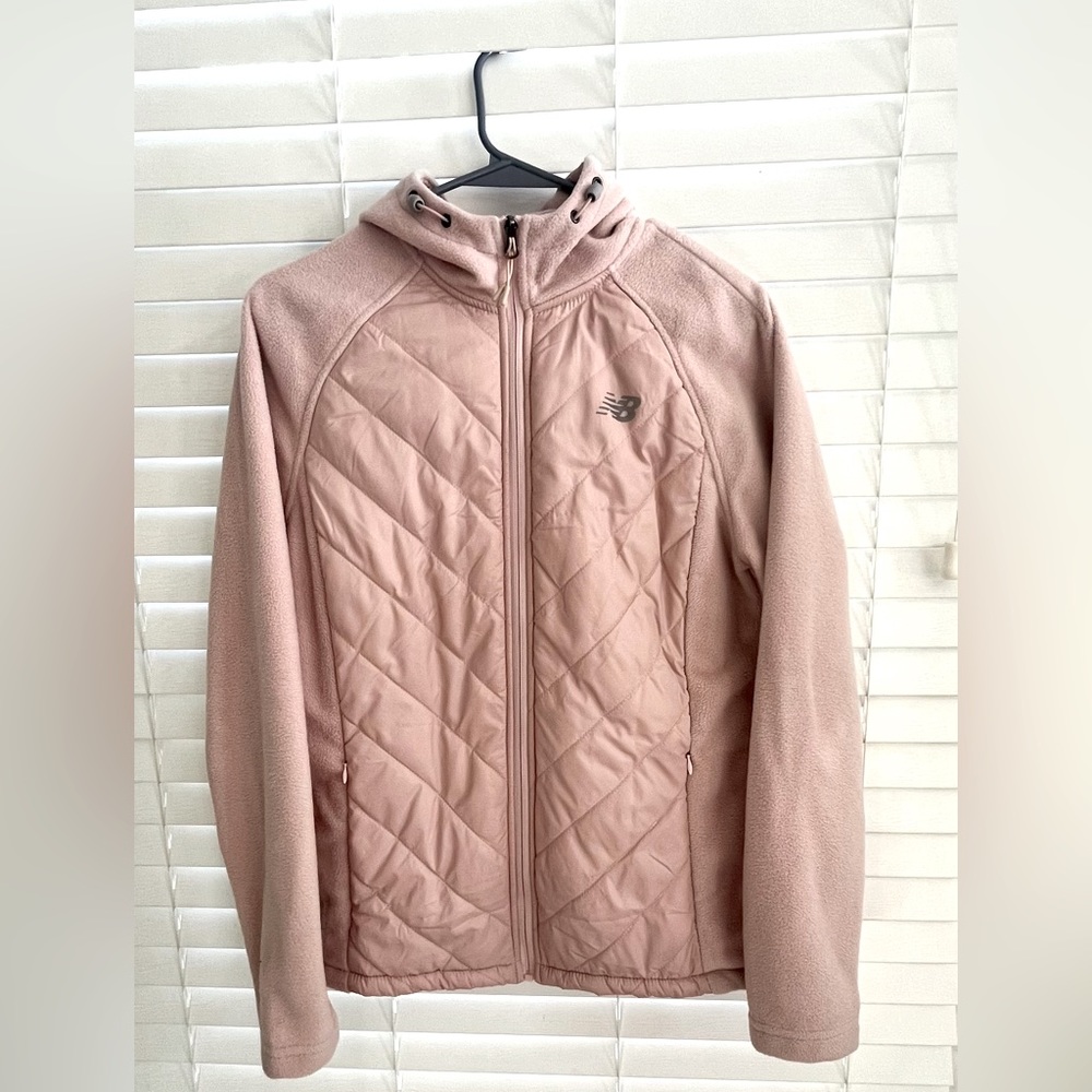 Hooded zip up women's jacket.